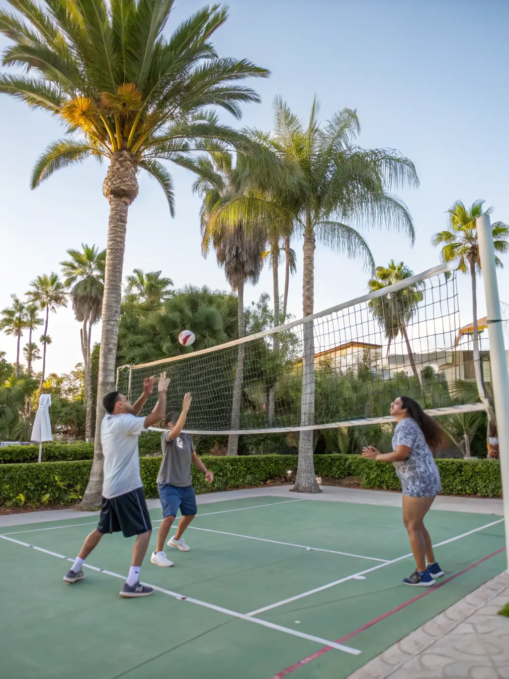 A group of diverse individuals participating in a team sport, such as volleyball or basketball, with smiles and expressions of teamwork, set against a backdrop of a sunny outdoor sports field.